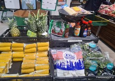 Cross-selling: everything for the BBQ - sauces, pineapple, grill tomatoes, corn, Bimi broccoli, and marshmallows.